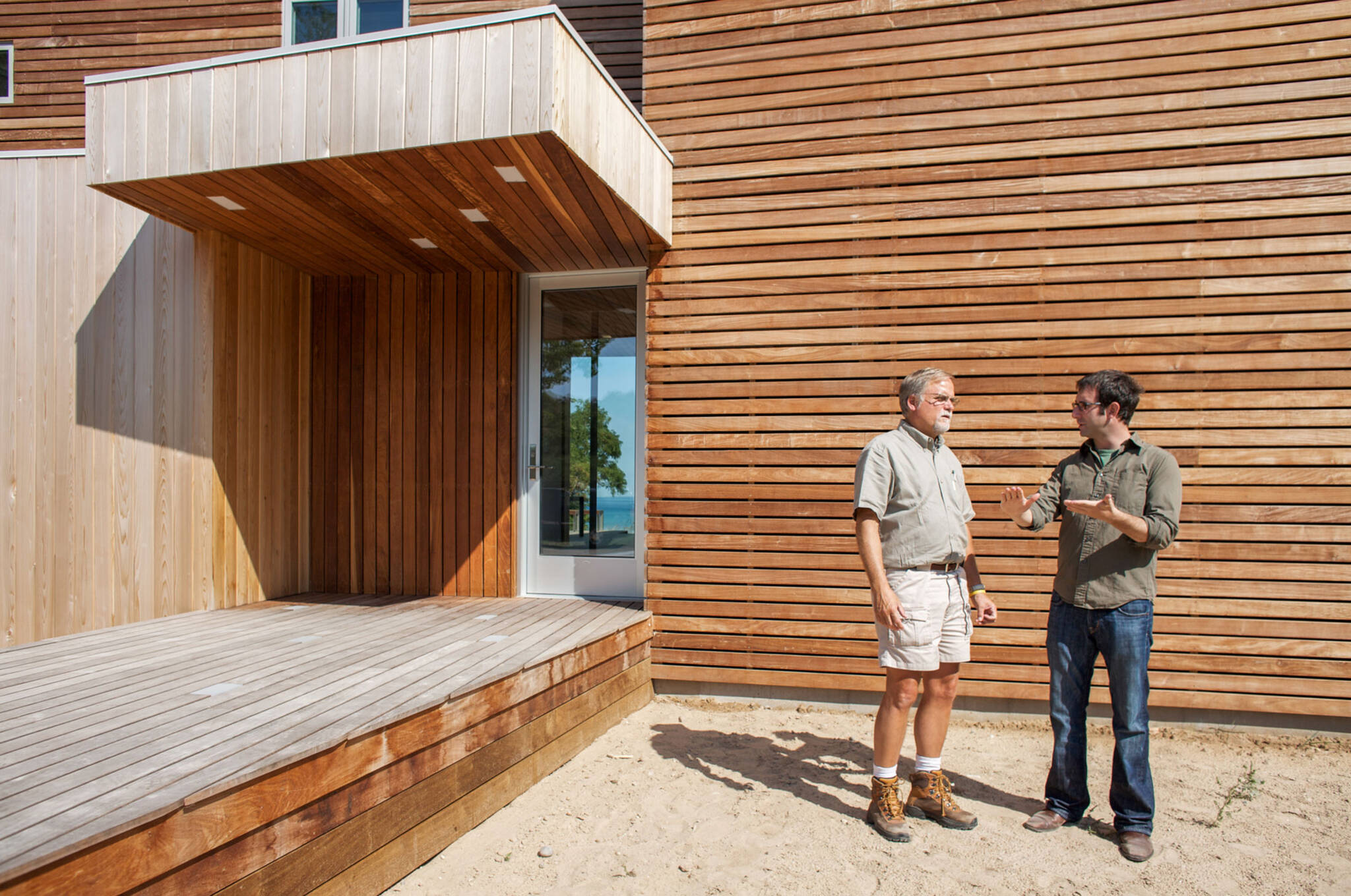 Human scale on the front door of the sustainable lake house project in Omena, Michigan designed by the architecture studio Danny Forster & Architecture