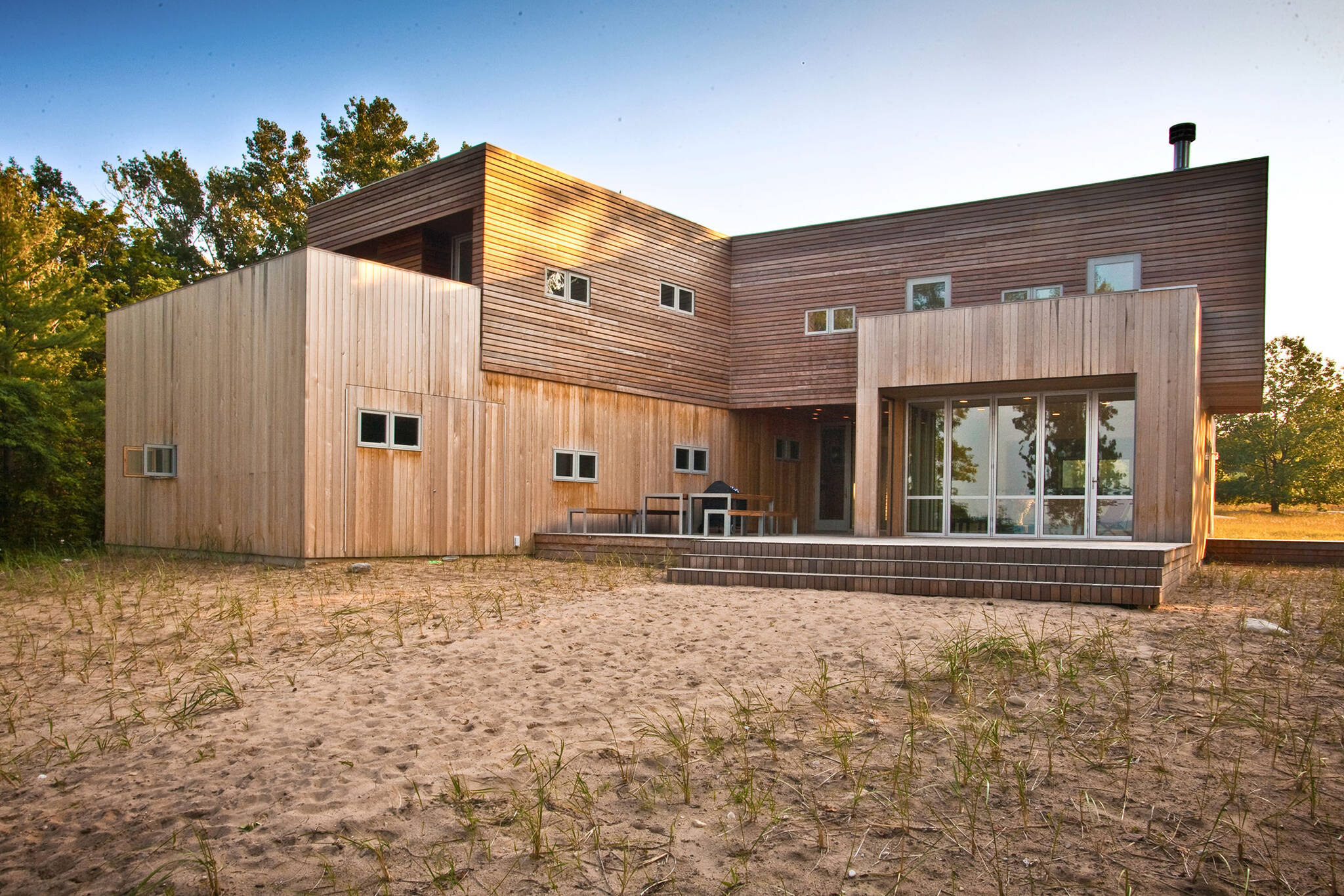 Wooden cladding facade of the sustainable lake house project in Omena, Michigan designed by the architecture studio Danny Forster & Architecture