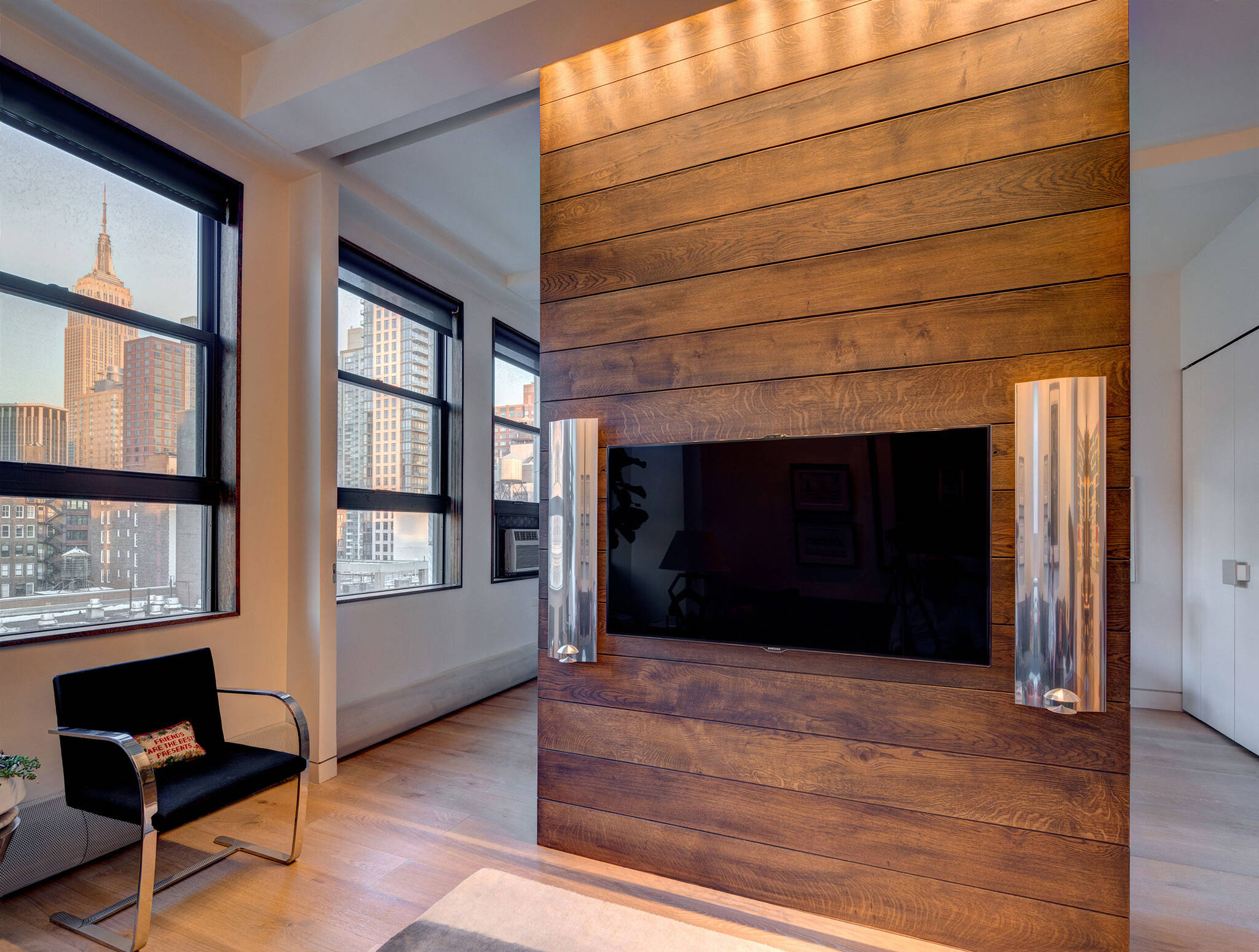 Empire State Building view from the living room of the residence renovation project in the Chelsea Mews building on the Flatiron District in Manhattan, New York City designed by the architecture studio Danny Forster & Architecture